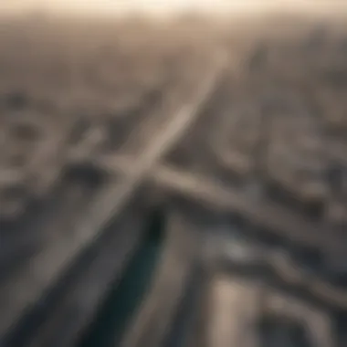 An aerial view showcasing the Dubai Metro in relation to major real estate developments.
