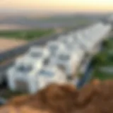 A panoramic view of Mussafah showcasing residential buildings and green spaces