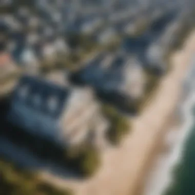 Aerial view of beach houses along a picturesque coastline